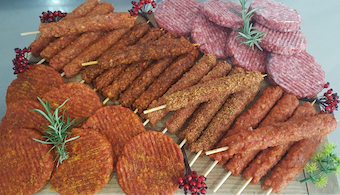 Handmade burgers and skewered meats prepared in-house at Reynolds Butchers.